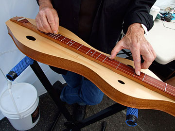 Old man playing an Appalachian Dulcimer