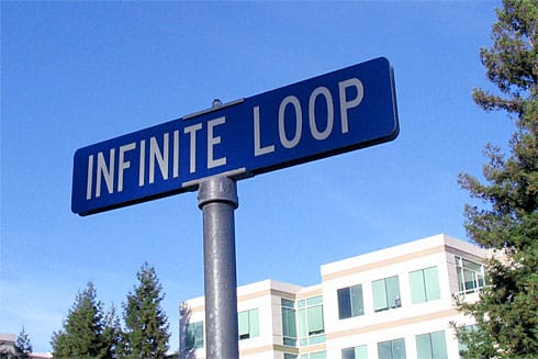 Infinite Loop street sign (Apple Campus behind) Infinite Loop street sign (Apple Campus behind)