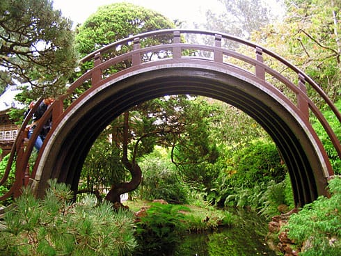 Drum Bridge arching over stream Drum Bridge (Taiko Bashi) arching over stream