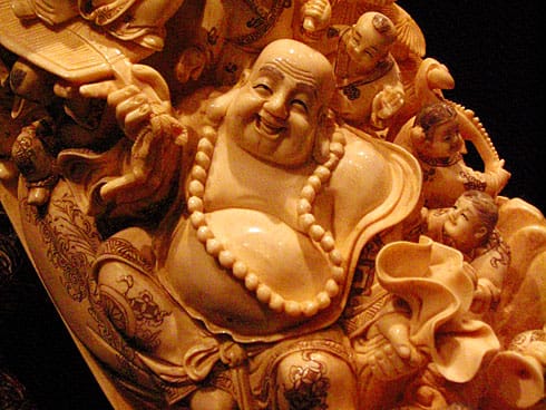 Budai (Hotai) Laughing Buddha carved into tusk Budai (Hotai, The Laughing Buddha) carved into Chinese tusk