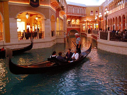 Four people on Gondola inside The Venetian Hotel