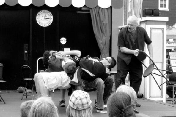 Magician removes the last chair of the quad