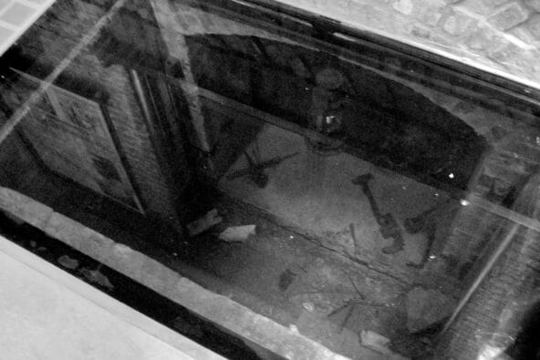 An old underground tunnel with tools
