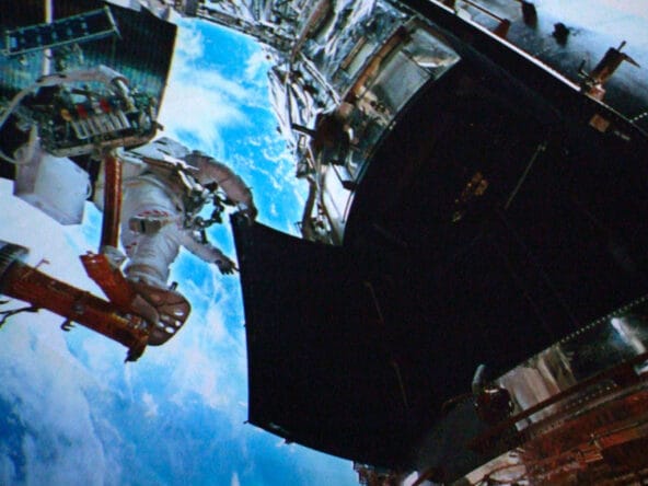 Astronaut working on Hubble telescope