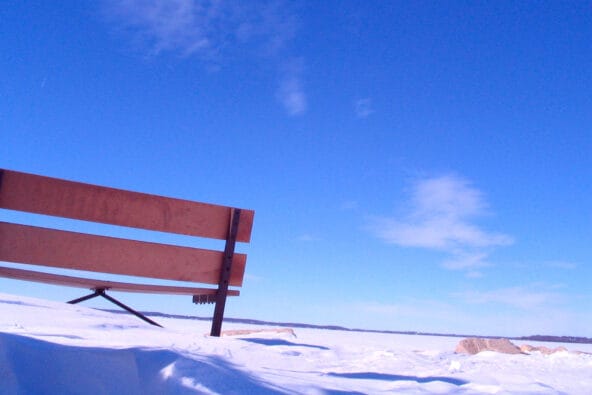 Blue Sky behind Wooden Bench