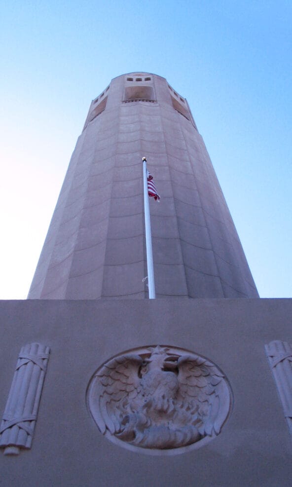 Coit Tower towering into blue sky