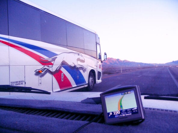 Driving beside Greyhound bus