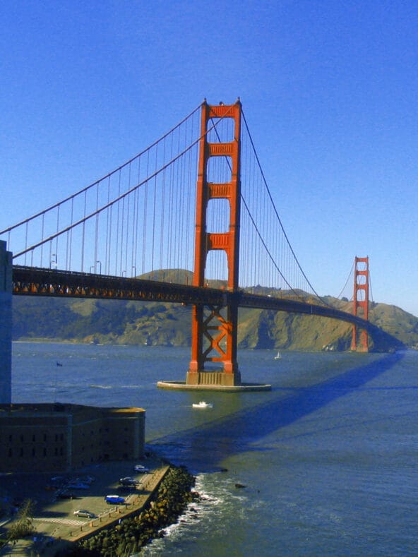 Golden Gate Bridge spanning above Fort Point