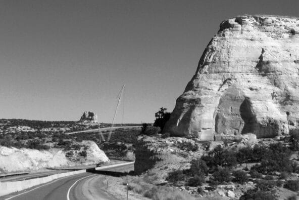 Huge rock formation above highway