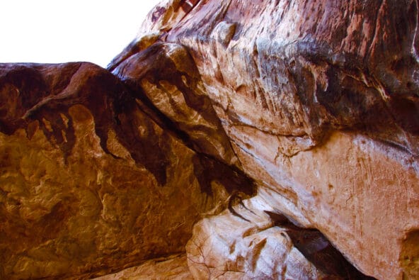 Looking up at trickling waterfall