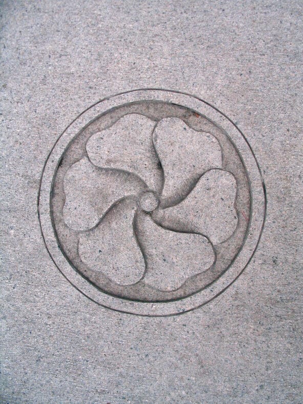 Lotus symbol carved into stone floor