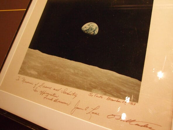 NASA photo of Earth signed by Frank Berman et al