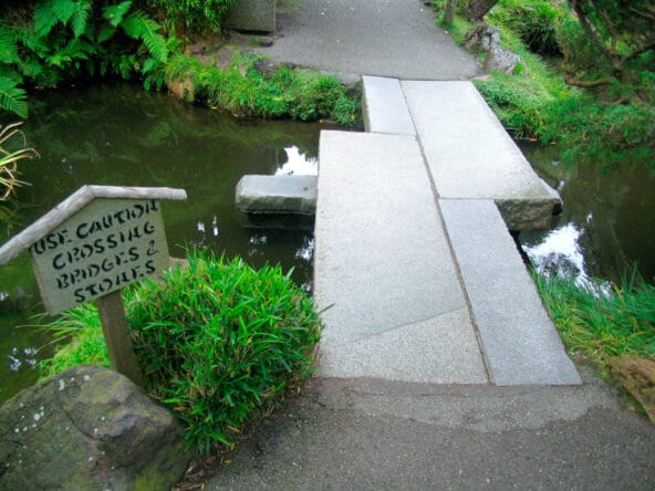 Narrow Stone bridge along path