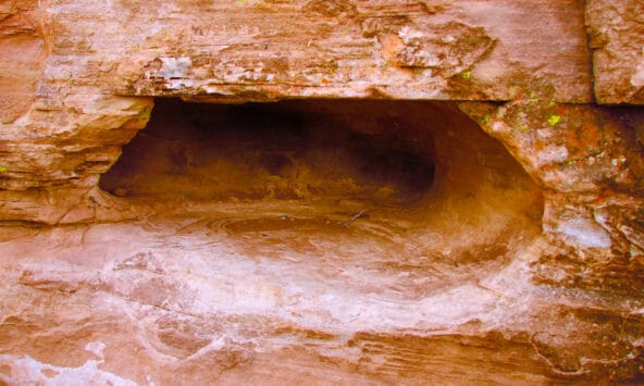 Natural cave hollowed out in sandstone