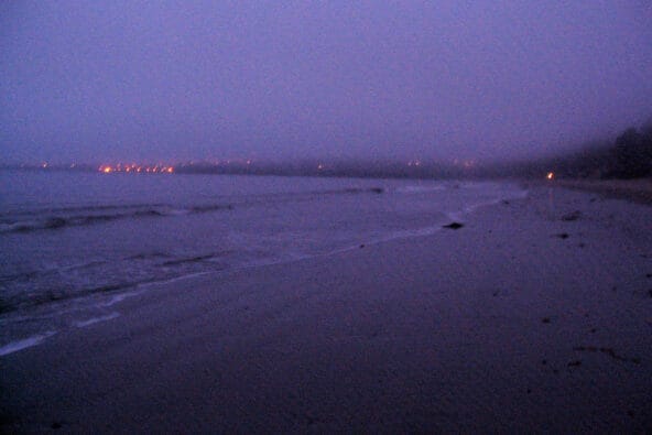 Orange lights of Capitola from beach