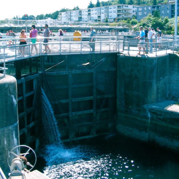 People crossing over the big Chittenden lock