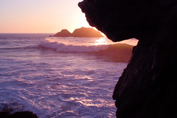 Sunset reflecting off incoming wave