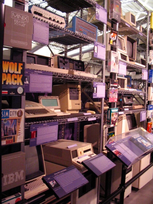 The 1st Macintosh nestled between early PCs