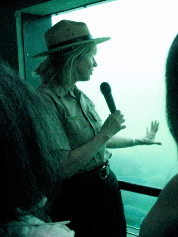 Tour guide explaining how Fish Ladder works