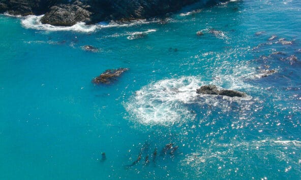 Water swirling in a bluegreen bay