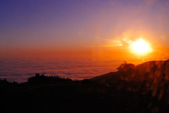Yellow Sunset over ocean clouds