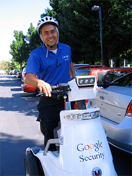 Google Security guy on electric scooter