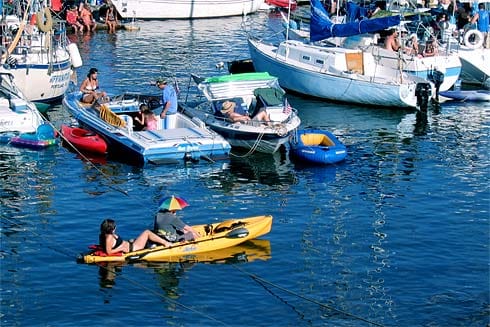 Boats and Yellow raft in Willamette River