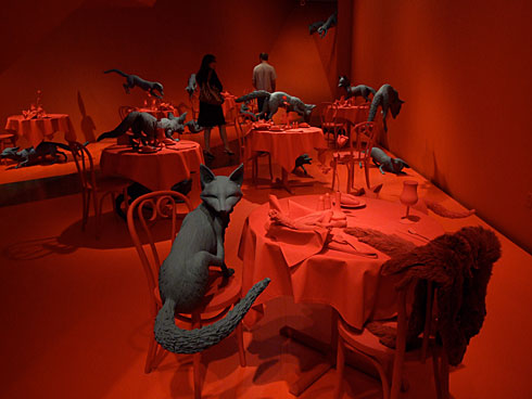 The red tables and grey foxes of Fox Games by Sandy Skoglund The red tables and grey foxes of Fox Games by Sandy Skoglund