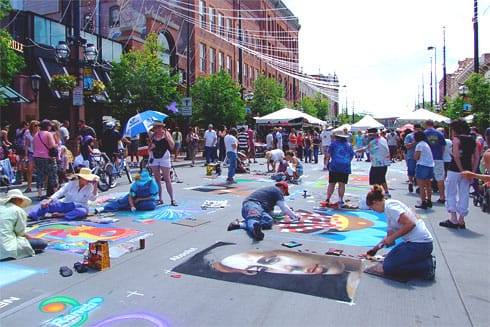 Many chalk artists drawing on the street
