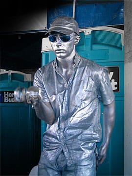 Mr. Statue doing contact juggling rotating Fushigi balls