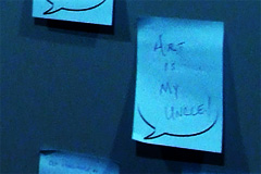 Art is my uncle! written on a piece of blue paper