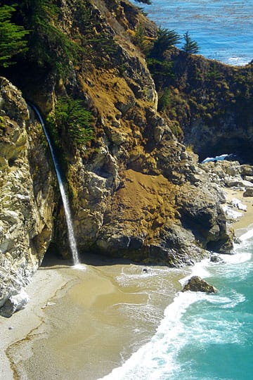 McWay Falls flowing into the Pacific Ocean