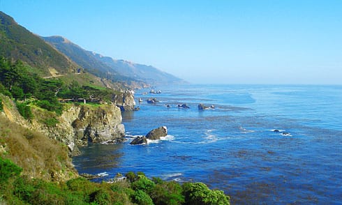 Looking South toward houses perched near cliffs
