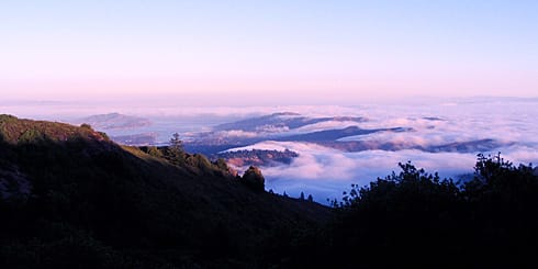 Clouds rolling over hills and Richardson Bay