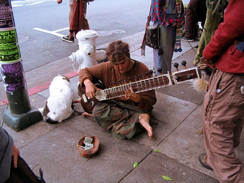 Street Performer playing sitar (busking)